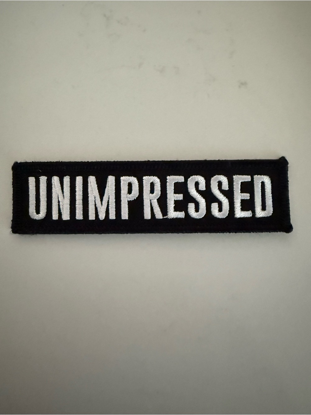 Unimpressed Embroidered Patch - Black & White